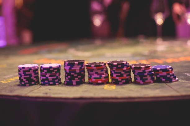 Treasures Aztec slot game interface showing five reels with Aztec temple theme